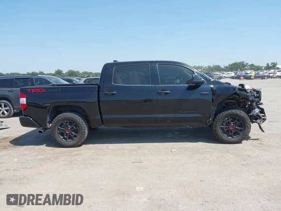 2020 Toyota Tundra SR5 with VIN 5TFDY5F14LX892112, listed as a IAAI auction lot 43150965 with 131,222 mi miles and . Bid and sale history available at DreamBid. Image 14.