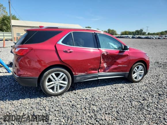 2020 Chevrolet Equinox Premier z VIN 3GNAXYEX0LS606584, wystawiony jako Copart lot #81235695 z przebiegiem 52 663 mil mil oraz Szkoda całkowita • Salvage title. Historia ofert i sprzedaży dostępna na DreamBid. Obrazek 3.