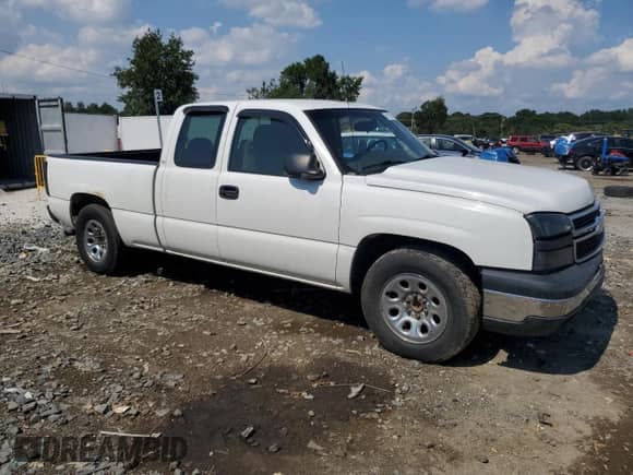 2006 Chevrolet Silverado 1500 LS with VIN 1GCEC19XX6Z276676, listed as a Copart auction lot 69102675 with 266,266 mi miles and Salvage title. Bid and sale history available at DreamBid. Image 4.