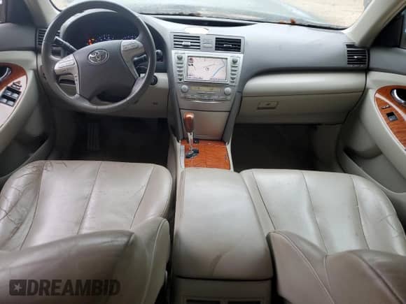 2010 Toyota Camry XLE с VIN JTNBK3EK6A3046538, выставлен на аукционе Copart как лот 84475235 с пробегом 188 516 миль миль и Списание • Salvage title. История ставок и продаж доступна на DreamBid. Изображение 8.