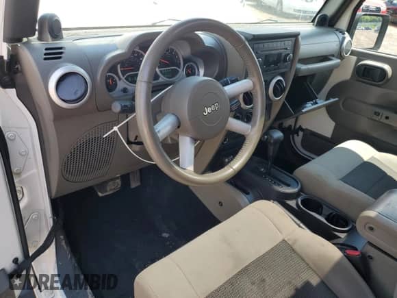 2010 Jeep Wrangler Sahara с VIN 1J4AA5D15AL167384, выставлен на аукционе Copart как лот 64210485 с пробегом 138 320 миль миль и Чистый • Clean title. История ставок и продаж доступна на DreamBid. Изображение 8.