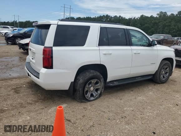 2020 Chevrolet Tahoe LS с VIN 1GNSCAKC8LR136896, выставлен на аукционе Copart как лот 58632255 с пробегом 53 267 миль миль и Списание • Salvage title. История ставок и продаж доступна на DreamBid. Изображение 3.