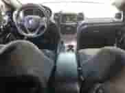 2016 Jeep Grand Cherokee Laredo with VIN 1C4RJEAG2GC501025, listed as a Copart auction lot 64325035 with 138,753 mi miles and Salvage title. Bid and sale history available at DreamBid. Image 8.