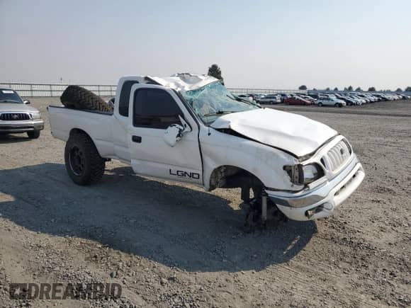 2000 Toyota Tacoma with VIN 5TEWN72N4YZ716361, listed as a Copart auction lot 71537215 with Not provided miles and Salvage title. Bid and sale history available at DreamBid. Image 4.