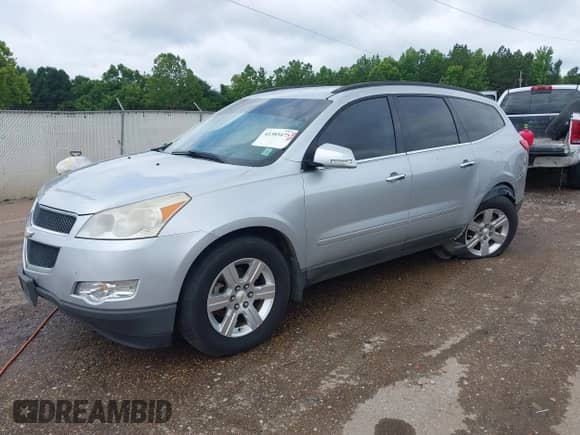 2012 Chevrolet Traverse 1LT z VIN 1GNKRGED2CJ173995, wystawiony jako IAAI lot #42385475 z przebiegiem 222 978 mil mil oraz . Historia ofert i sprzedaży dostępna na DreamBid. Obrazek 23.