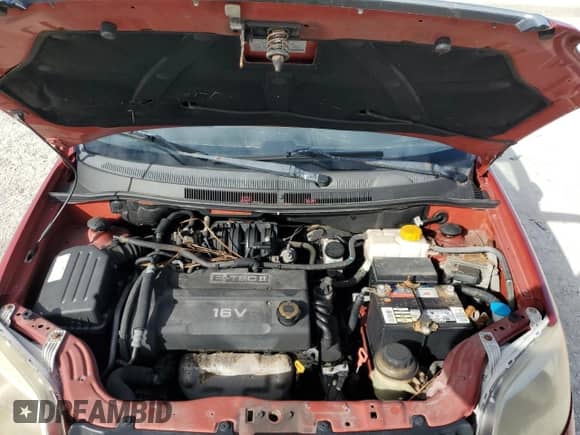 2007 Chevrolet Aveo LS z VIN KL1TD56617B051863, wystawiony jako Copart lot #79996804 z przebiegiem Nie podano mil oraz Szkoda całkowita • Salvage title. Historia ofert i sprzedaży dostępna na DreamBid. Obrazek 11.