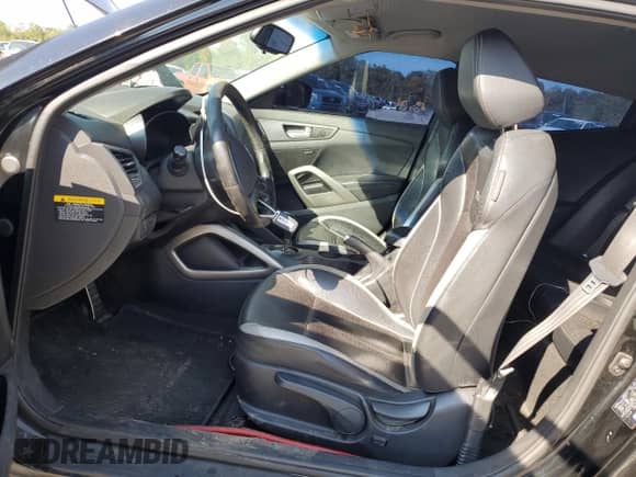 2013 Hyundai Veloster Turbo с VIN KMHTC6AE0DU148225, выставлен на аукционе Copart как лот 80101495 с пробегом 140 047 миль миль и Чистый • Clean title. История ставок и продаж доступна на DreamBid. Изображение 7.