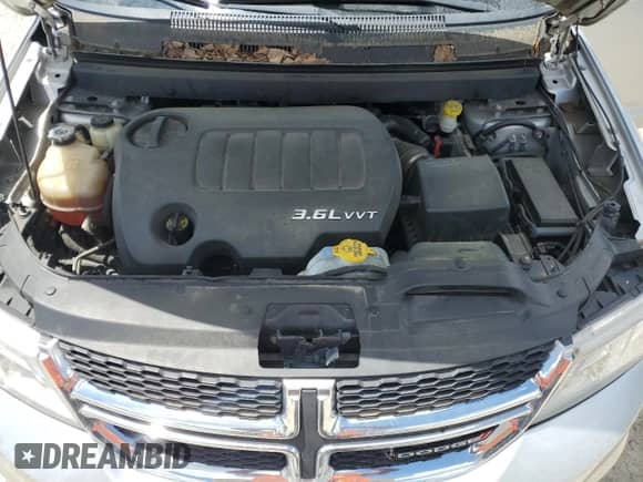 2014 Dodge Journey Limited z VIN 3C4PDCDGXET132933, wystawiony jako Copart lot #57870275 z przebiegiem 153 886 mil mil oraz Szkoda całkowita • Salvage title. Historia ofert i sprzedaży dostępna na DreamBid. Obrazek 12.