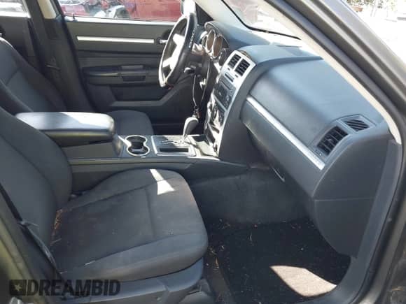 2010 Dodge Charger SXT with VIN 2B3CA3CV8AH217037, listed as a IAAI auction lot 43364119 with 239,874 mi miles and . Bid and sale history available at DreamBid. Image 5.