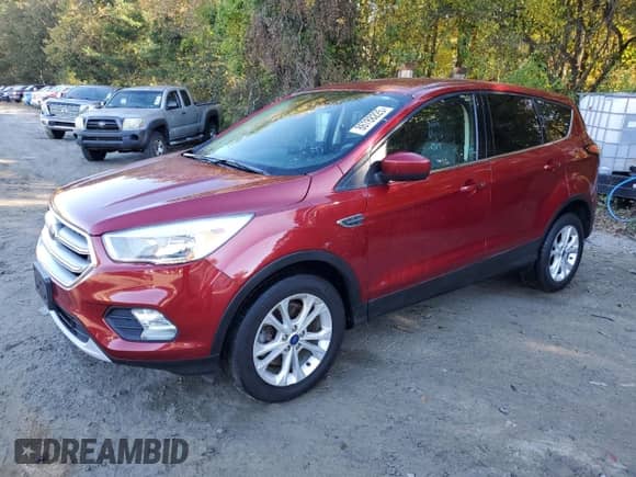 2017 Ford Escape SE с VIN 1FMCU9GD7HUC71197, выставлен на аукционе Copart как лот 86788225 с пробегом 105 399 миль миль и Чистый • Clean title. История ставок и продаж доступна на DreamBid. Изображение 1.