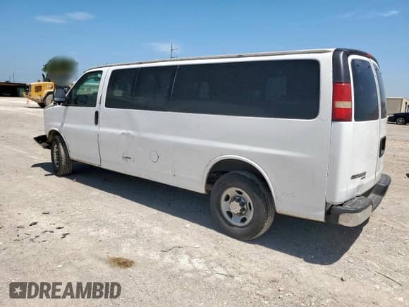 2013 Chevrolet Express Passenger LT with VIN 1GAZG1FG3D1159598, listed as a Copart auction lot 65791265 with 436,846 mi miles and Salvage title. Bid and sale history available at DreamBid. Image 2.
