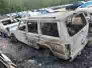 2000 Jeep Grand Cherokee with VIN 1J4FT28P6YL267968, listed as a Copart auction lot 63980434 with 309,367 mi miles and Clean title. Bid and sale history available at DreamBid. Image 2.