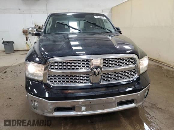 2014 Ram 1500 Laramie z VIN 1C6RR7NM0ES402167, wystawiony jako Copart lot #67562435 z przebiegiem 90 335 mil mil oraz Czysty tytuł • Clean title. Historia ofert i sprzedaży dostępna na DreamBid. Obrazek 5.