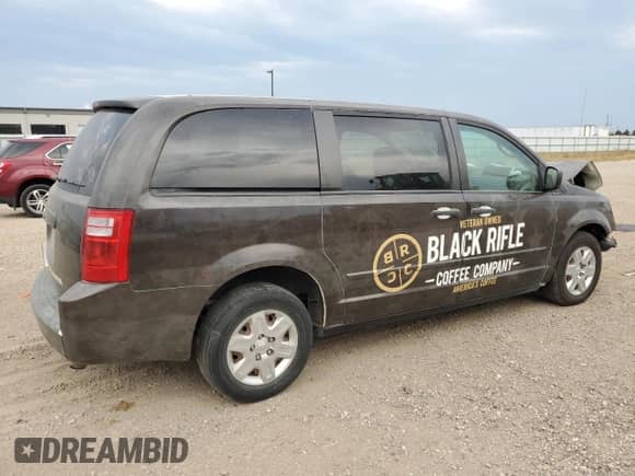 2009 Dodge Caravan with VIN 2D8HN11E09R682984, listed as a Copart auction lot 71401844 with 58,819 mi miles and Salvage title. Bid and sale history available at DreamBid. Image 3.