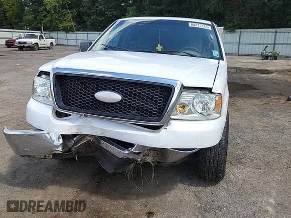2007 Ford F-150 STX with VIN 1FTRX12W57FA37403, listed as a Copart auction lot 84213265 with 2,342,455 mi miles and Salvage title. Bid and sale history available at DreamBid. Image 13.