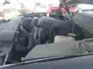 2009 Chevrolet Suburban LTZ z VIN 1GNFK36359R219818, wystawiony jako IAAI lot #42120323 z przebiegiem 146 999 mil mil oraz . Historia ofert i sprzedaży dostępna na DreamBid. Obrazek 19.