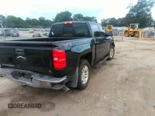 2018 Chevrolet Silverado 1500 LT z VIN 3GCUKREC2JG500516, wystawiony jako IAAI lot #43308176 z przebiegiem 82 892 mil mil oraz . Historia ofert i sprzedaży dostępna na DreamBid. Obrazek 4.