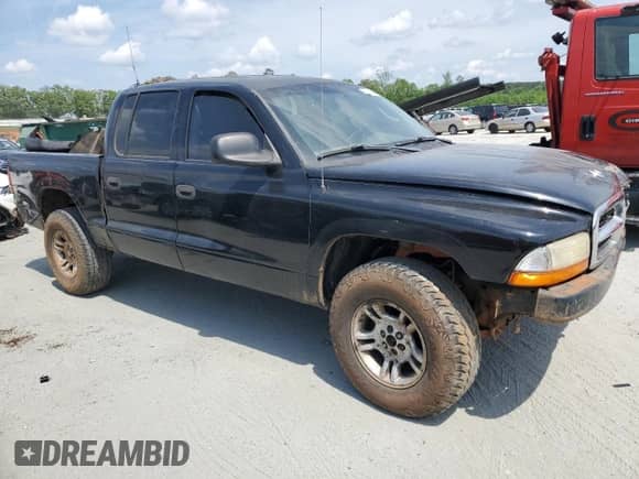 2003 Dodge Dakota с VIN 1D7HG38Z13S220152, выставлен на аукционе Copart как лот 54314515 с пробегом Не указан миль и Списание • Salvage title. История ставок и продаж доступна на DreamBid. Изображение 4.