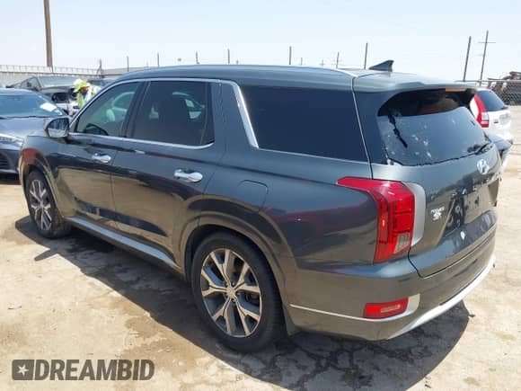 2021 Hyundai Palisade Limited with VIN KM8R54HEXMU198094, listed as a IAAI auction lot 42502734 with 71,390 mi miles and . Bid and sale history available at DreamBid. Image 3.