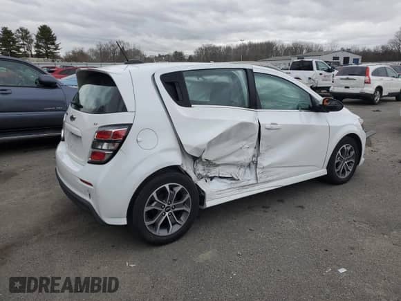 2018 Chevrolet Sonic LT with VIN 1G1JD6SB8J4112882, listed as a Copart auction lot 50329714 with 92,192 mi miles and Salvage title. Bid and sale history available at DreamBid. Image 3.