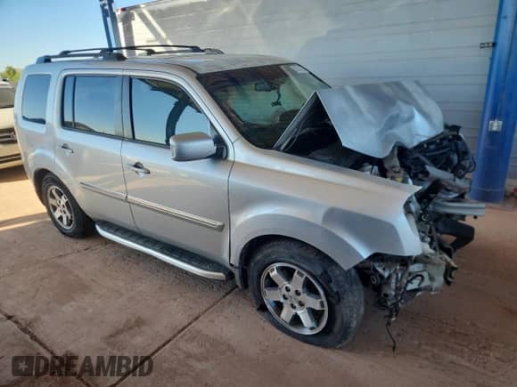 2009 Honda Pilot Touring with VIN 5FNYF48889B042501, listed as a Copart auction lot 82244955 with 187,616 mi miles and Salvage title. Bid and sale history available at DreamBid. Image 4.