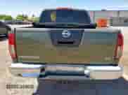 2005 Nissan Frontier SE with VIN 1N6AD07U15C402856, listed as a Copart auction lot 65883815 with 130,400 mi miles and Salvage title. Bid and sale history available at DreamBid. Image 6.