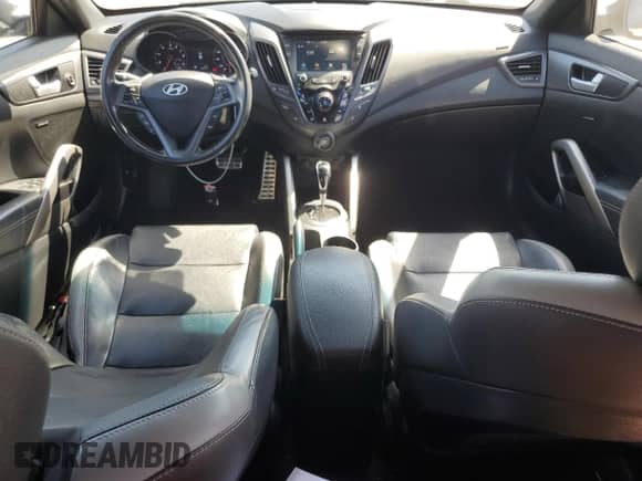 2017 Hyundai Veloster Turbo с VIN KMHTC6AE5HU314762, выставлен на аукционе Copart как лот 70288505 с пробегом 90 991 миль миль и Списание • Salvage title. История ставок и продаж доступна на DreamBid. Изображение 8.