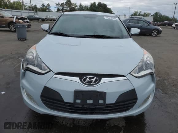 2015 Hyundai Veloster z VIN KMHTC6AD5FU223446, wystawiony jako Copart lot #69798925 z przebiegiem 81 772 mil mil oraz Szkoda całkowita • Salvage title. Historia ofert i sprzedaży dostępna na DreamBid. Obrazek 5.