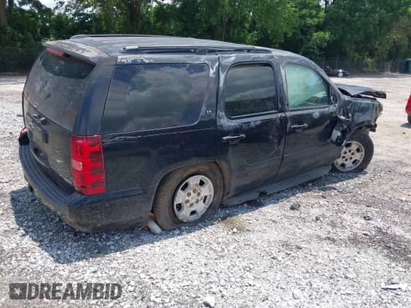 2008 Chevrolet Tahoe LTZ with VIN 1GNFC13048J151892, listed as a IAAI auction lot 42462533 with 260,529 mi miles and . Bid and sale history available at DreamBid. Image 4.