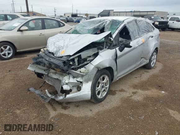 2015 Ford Fiesta SE with VIN 3FADP4BJ2FM220598, listed as a IAAI auction lot 41213342 with Not provided miles and . Bid and sale history available at DreamBid. Image 2.
