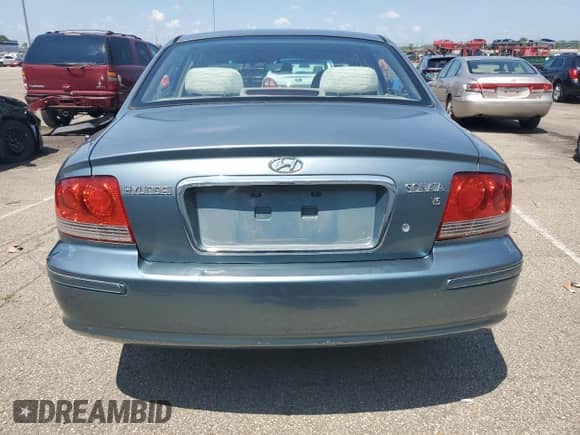 2004 Hyundai Sonata z VIN KMHWF25H14A085736, wystawiony jako Copart lot #60663805 z przebiegiem 181 698 mil mil oraz Szkoda całkowita • Salvage title. Historia ofert i sprzedaży dostępna na DreamBid. Obrazek 6.