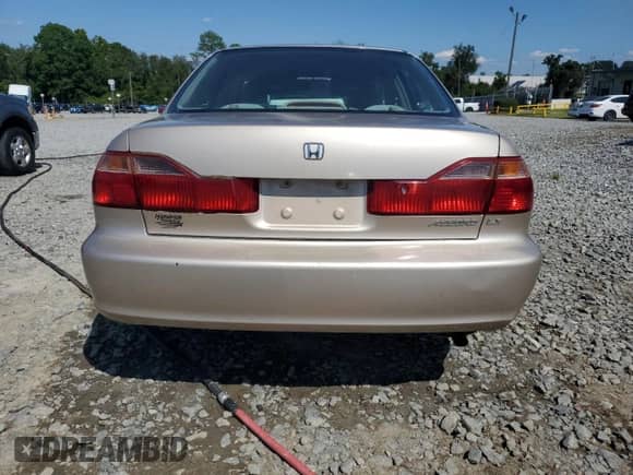 2000 Honda Accord LX с VIN 1HGCG5648YA044898, выставлен на аукционе Copart как лот 70706415 с пробегом 151 386 миль миль и Списание • Salvage title. История ставок и продаж доступна на DreamBid. Изображение 6.