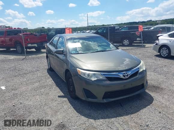 2014 Toyota Camry XLE with VIN 4T4BF1FK1ER360045, listed as a IAAI auction lot 43067990 with 117,852 mi miles and . Bid and sale history available at DreamBid. Image 1.