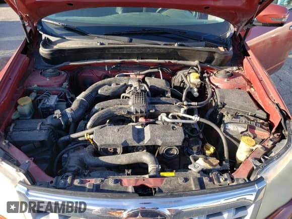 2011 Subaru Forester z VIN JF2SHBHC6BH700347, wystawiony jako Copart lot #86969884 z przebiegiem 222 214 mil mil oraz Szkoda całkowita • Salvage title. Historia ofert i sprzedaży dostępna na DreamBid. Obrazek 12.