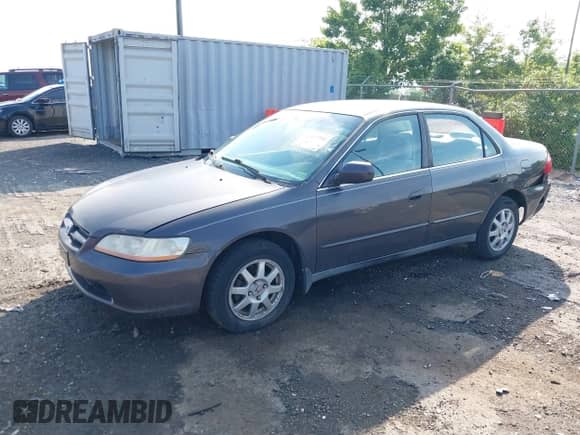 1999 Honda Accord LX with VIN 1HGCG6654XA100896, listed as a IAAI auction lot 42613354 with 154,176 mi miles and . Bid and sale history available at DreamBid. Image 2.