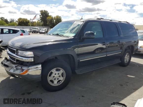 2003 Chevrolet Suburban with VIN 1GNFK16T83J218673, listed as a Copart auction lot 70991614 with 146,490 mi miles and Salvage title. Bid and sale history available at DreamBid. Image 1.
