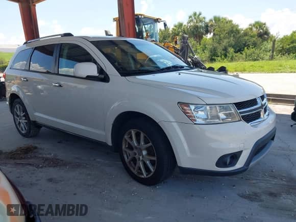 2013 Dodge Journey Crew z VIN 3C4PDCDG7DT558934, wystawiony jako IAAI lot #42869150 z przebiegiem 234 427 mil mil oraz . Historia ofert i sprzedaży dostępna na DreamBid. Obrazek 1.