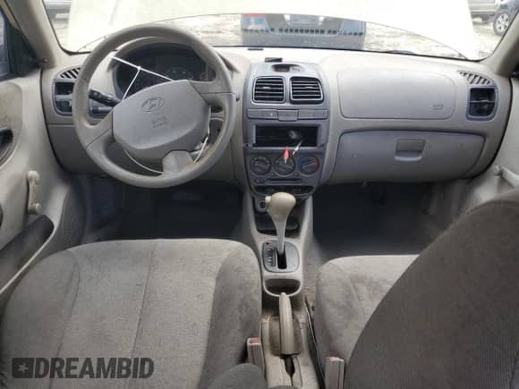 2002 Hyundai Accent GL z VIN KMHCG45C02U296132, wystawiony jako Copart lot #59401835 z przebiegiem 115 421 mil mil oraz Czysty tytuł • Clean title. Historia ofert i sprzedaży dostępna na DreamBid. Obrazek 8.