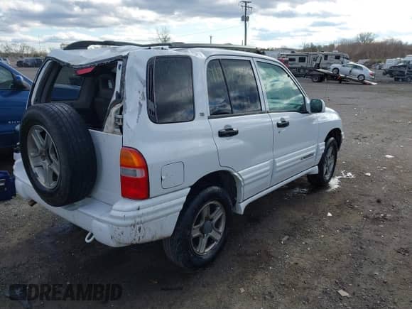 2004 Chevrolet Tracker LT with VIN 2CNBJ634646906802, listed as a IAAI auction lot 41737592 with 129,547 mi miles and . Bid and sale history available at DreamBid. Image 4.