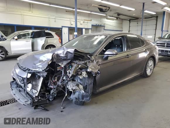 2018 Toyota Camry XSE с VIN 4T1BZ1HK2JU008116, выставлен на аукционе Copart как лот 71818605 с пробегом Не указан миль и Списание • Salvage title. История ставок и продаж доступна на DreamBid. Изображение 1.