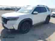 2023 Honda Pilot Touring с VIN 5FNYG2H77PB013738, выставлен на аукционе IAAI как лот 42013874 с пробегом 33 677 миль миль и . История ставок и продаж доступна на DreamBid. Изображение 2.