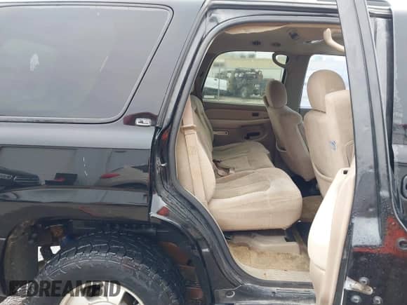 2001 Chevrolet Tahoe LT z VIN 1GNEC13T91R165851, wystawiony jako IAAI lot #41484165 z przebiegiem 279 544 mil mil oraz . Historia ofert i sprzedaży dostępna na DreamBid. Obrazek 8.