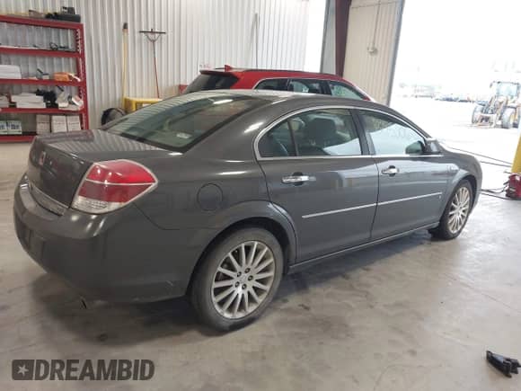 2007 Saturn Aura XR with VIN 1G8ZV57747F210983, listed as a IAAI auction lot 43295306 with 173,210 mi miles and . Bid and sale history available at DreamBid. Image 4.
