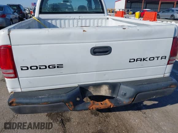 2003 Dodge Dakota с VIN 1D7HG12X43S345125, выставлен на аукционе IAAI как лот 41327861 с пробегом 312 385 миль миль и . История ставок и продаж доступна на DreamBid. Изображение 14.