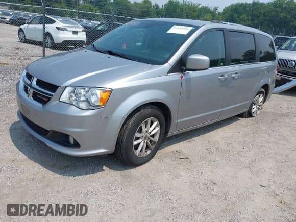 2020 Dodge Grand Caravan SXT with VIN 2C4RDGCGXLR160961, listed as a IAAI auction lot 42891500 with 125,048 mi miles and . Bid and sale history available at DreamBid. Image 2.