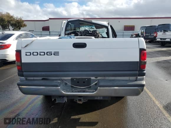 1999 Dodge 2500 with VIN 1B7KC23Z0XJ608515, listed as a Copart auction lot 41465555 with Not provided miles and Salvage title. Bid and sale history available at DreamBid. Image 6.