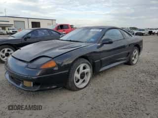 1991 Dodge Stealth with VIN JB3XE74C2MY017971, listed as a Copart auction lot 79442074 with 56,890 mi miles and Salvage title. Bid and sale history available at DreamBid. Image 1.