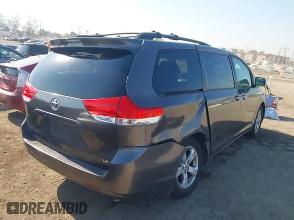2011 Toyota Sienna LE with VIN 5TDKK3DC5BS125486, listed as a IAAI auction lot 42934003 with 104,158 mi miles and . Bid and sale history available at DreamBid. Image 4.