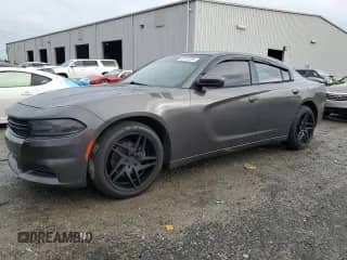 2015 Dodge Charger SE with VIN 2C3CDXBG4FH745234, listed as a Copart auction lot 82315205 with 188,203 mi miles and Clean title. Bid and sale history available at DreamBid. Image 1.