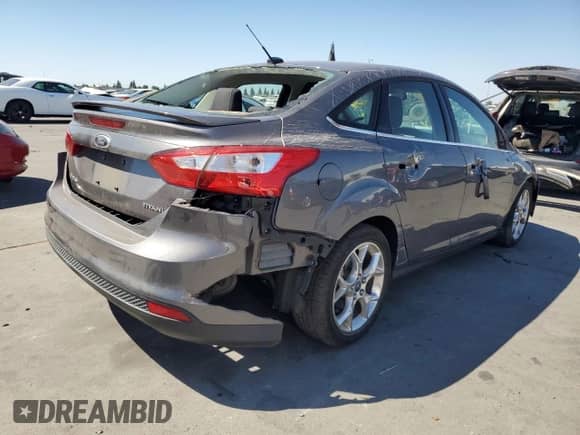 2012 Ford Focus Titanium с VIN 1FAHP3J29CL268036, выставлен на аукционе Copart как лот 70782895 с пробегом 72 791 миль миль и Списание • Salvage title. История ставок и продаж доступна на DreamBid. Изображение 3.